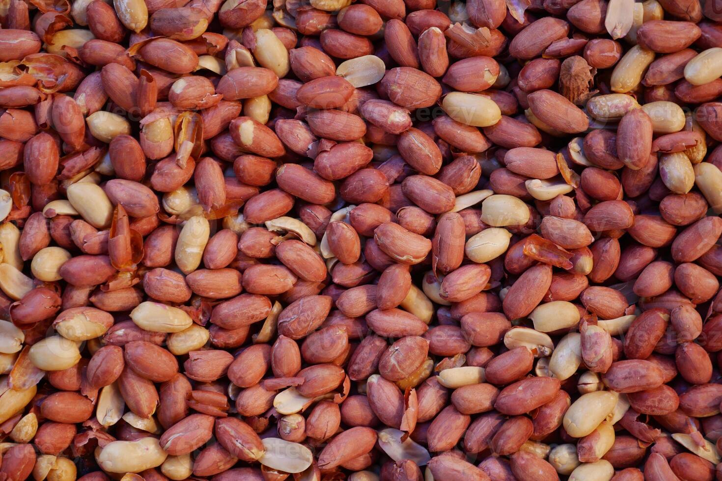 top view of peeled peanuts background photo