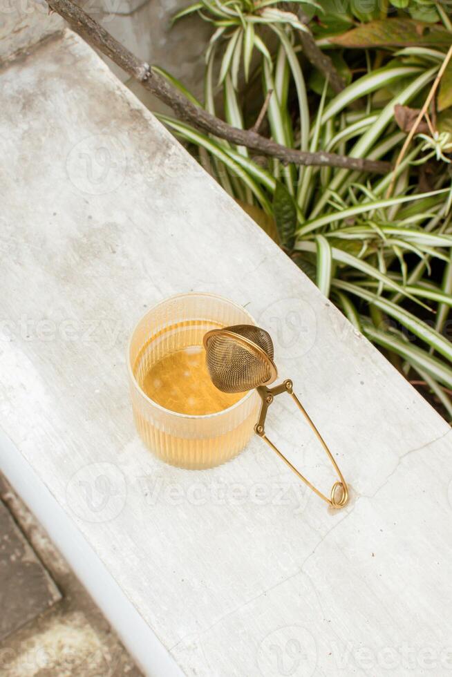 Tea with Infuser in the Garden photo