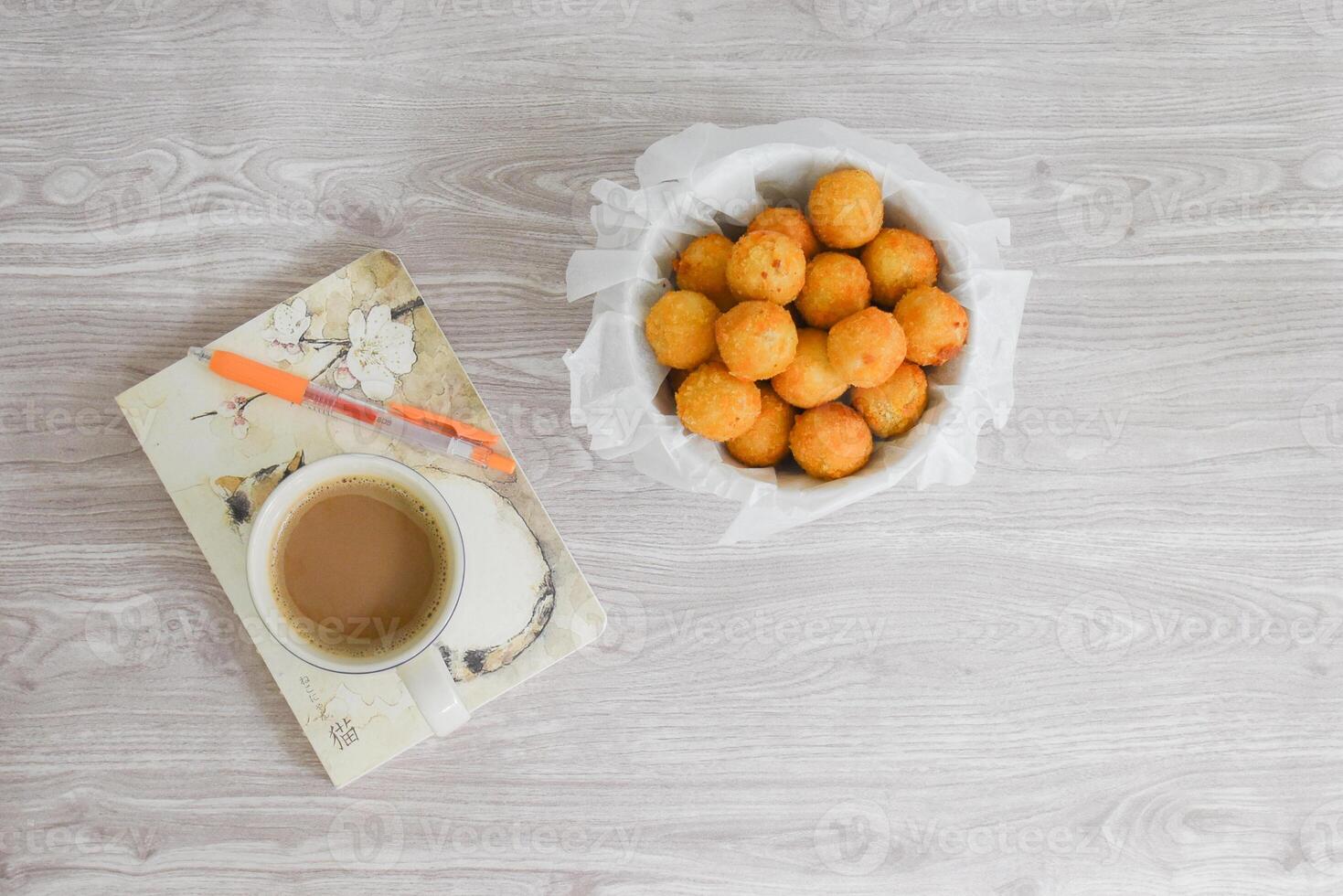Bitterballen on Working Table with Coffee photo