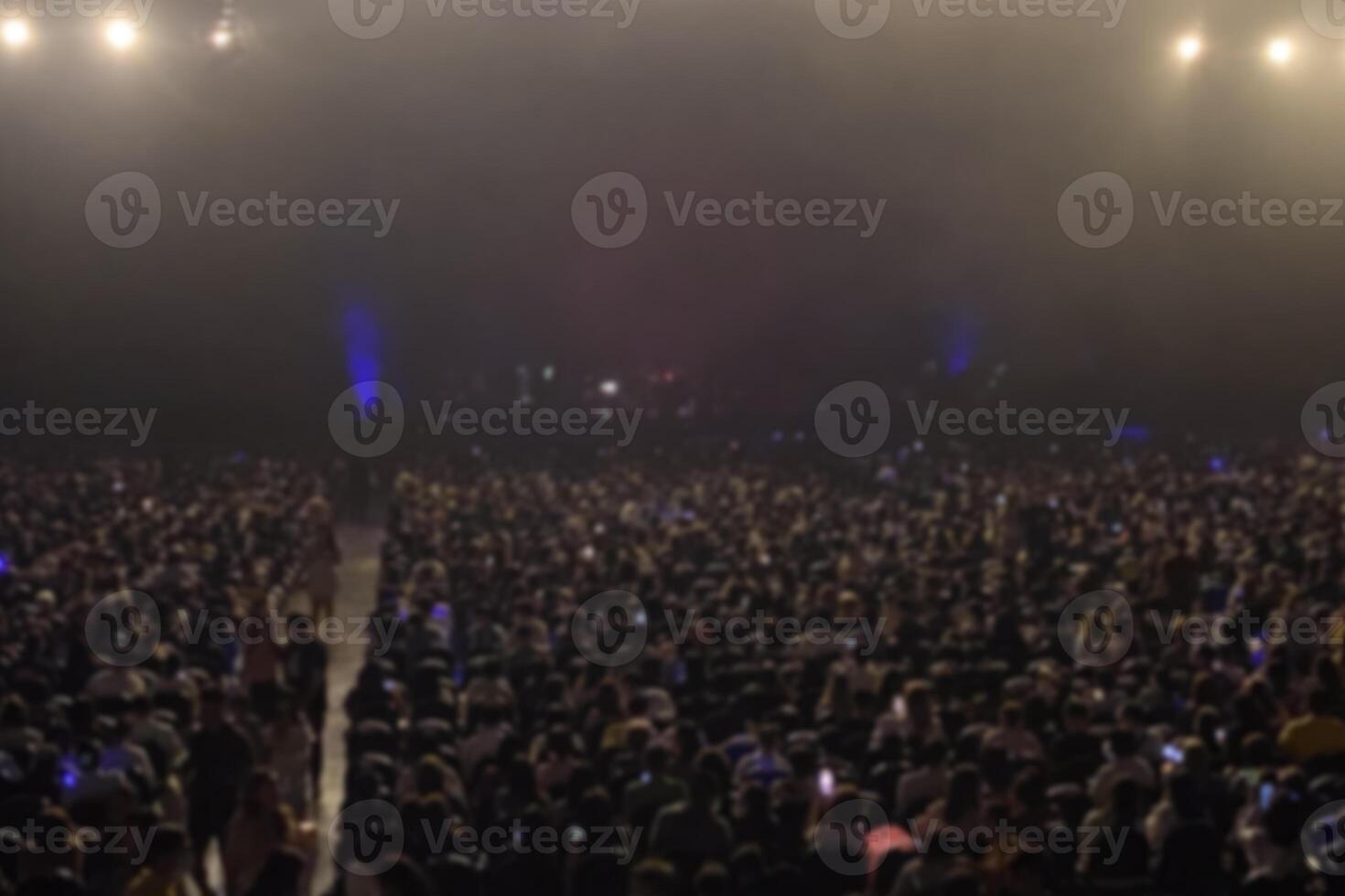 Blur background of back of crowd on the scene in concert. photo