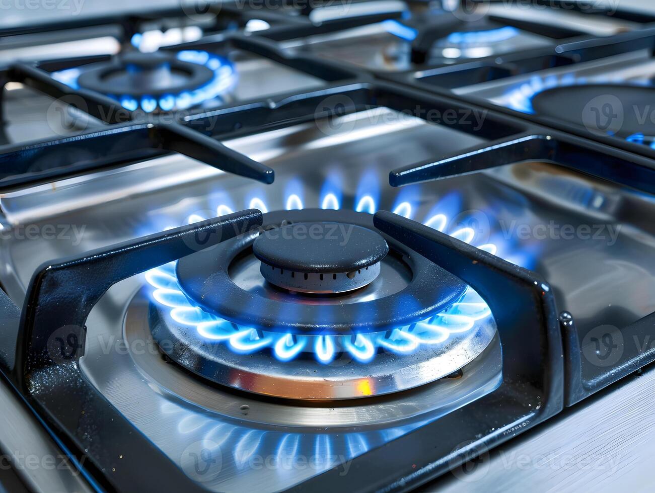 Gas burns on the burner of a gas stove with coins. Background for your design photo