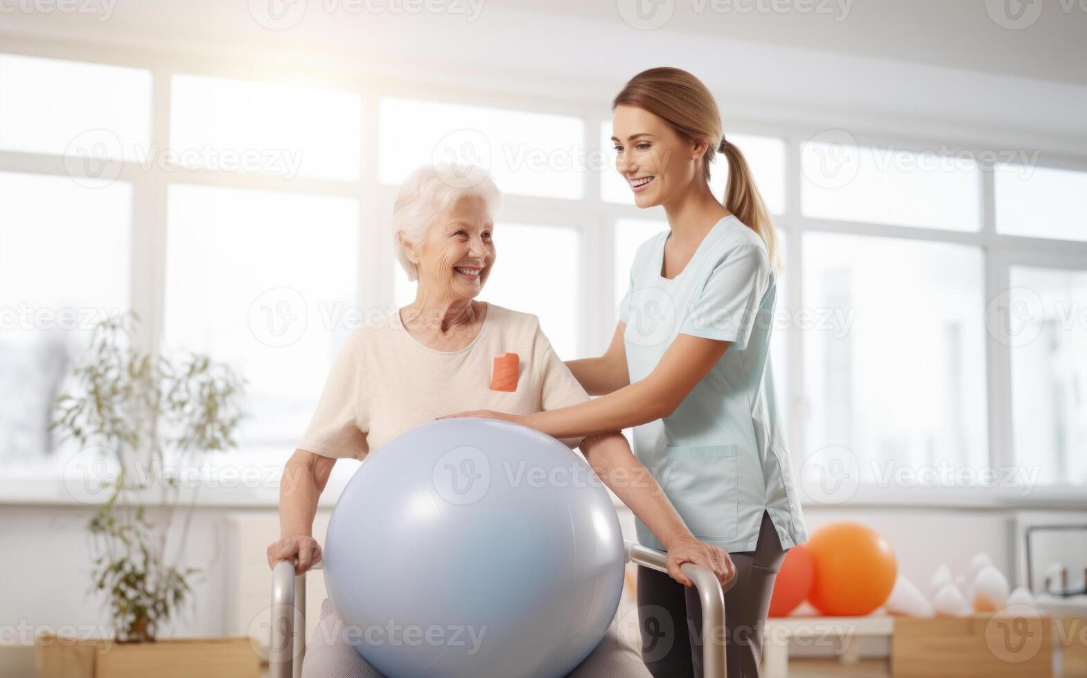 A medical professional engages in therapeutic exercises with an elderly woman in a wheelchair, utilizing a ball and various aids, exemplifying compassionate care and rehabilitation photo