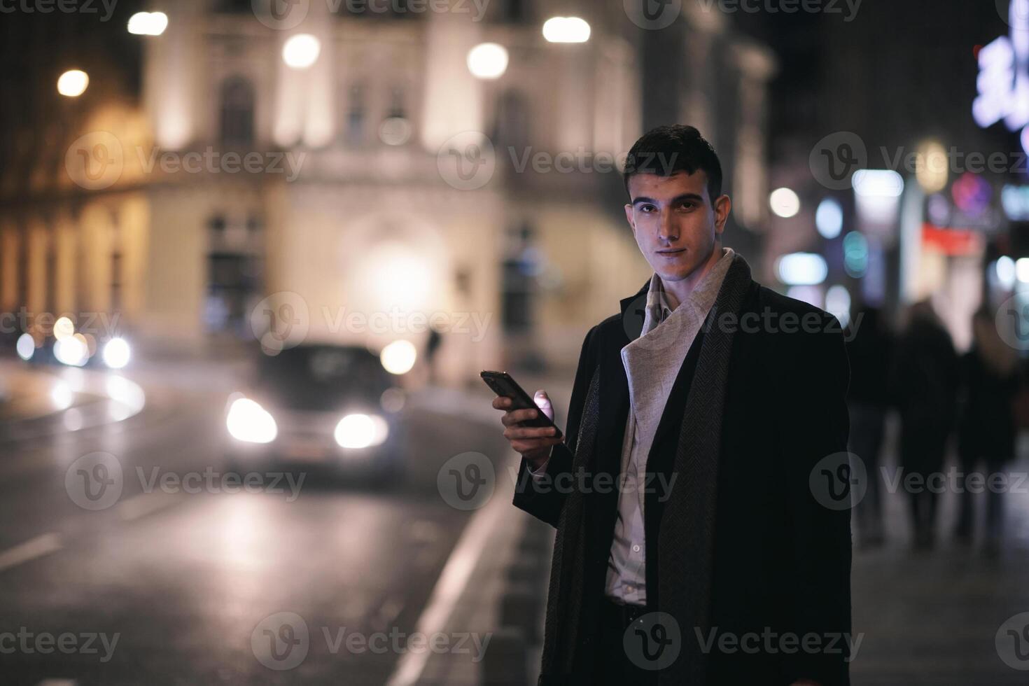 Smiling Meedle Eastern man walking down street near modern office building, photo