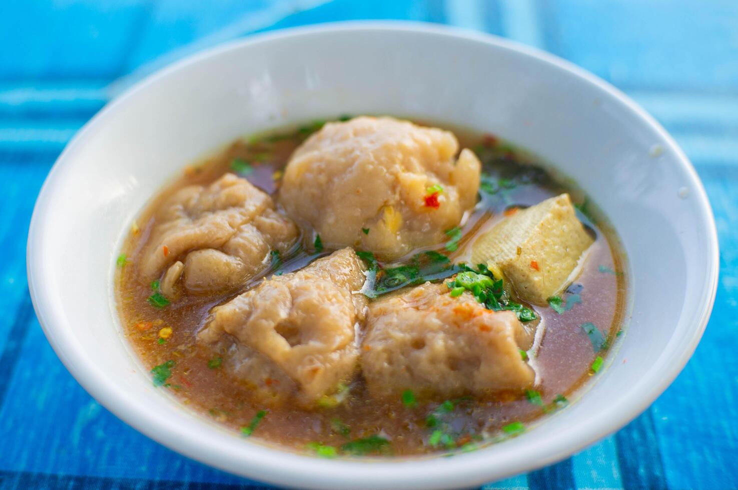 tofu meatballs, traditional food with warm sauce photo