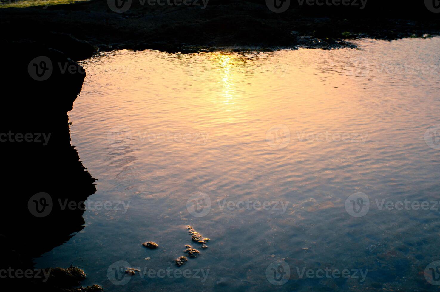 sunset silhouette on the beach photo
