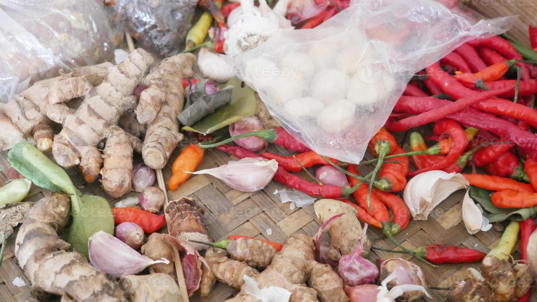Garlic, ginger, red chili peppers, and other spices can be used to create vibrant food themed designs for recipes or cooking blogs. photo