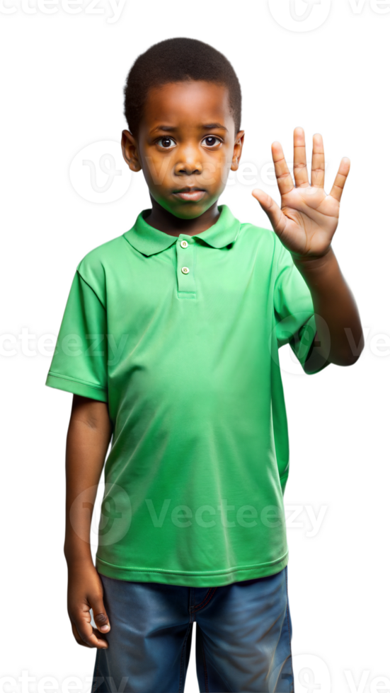 A young boy in a green shirt makes a stop sign with a serious expression on his face. png