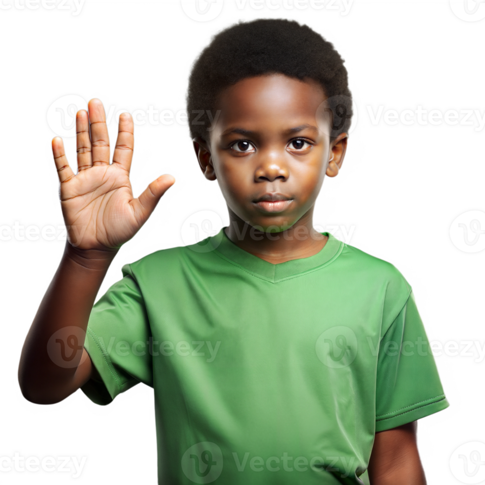 A young boy in a green shirt makes a stop sign with a serious expression on his face. png