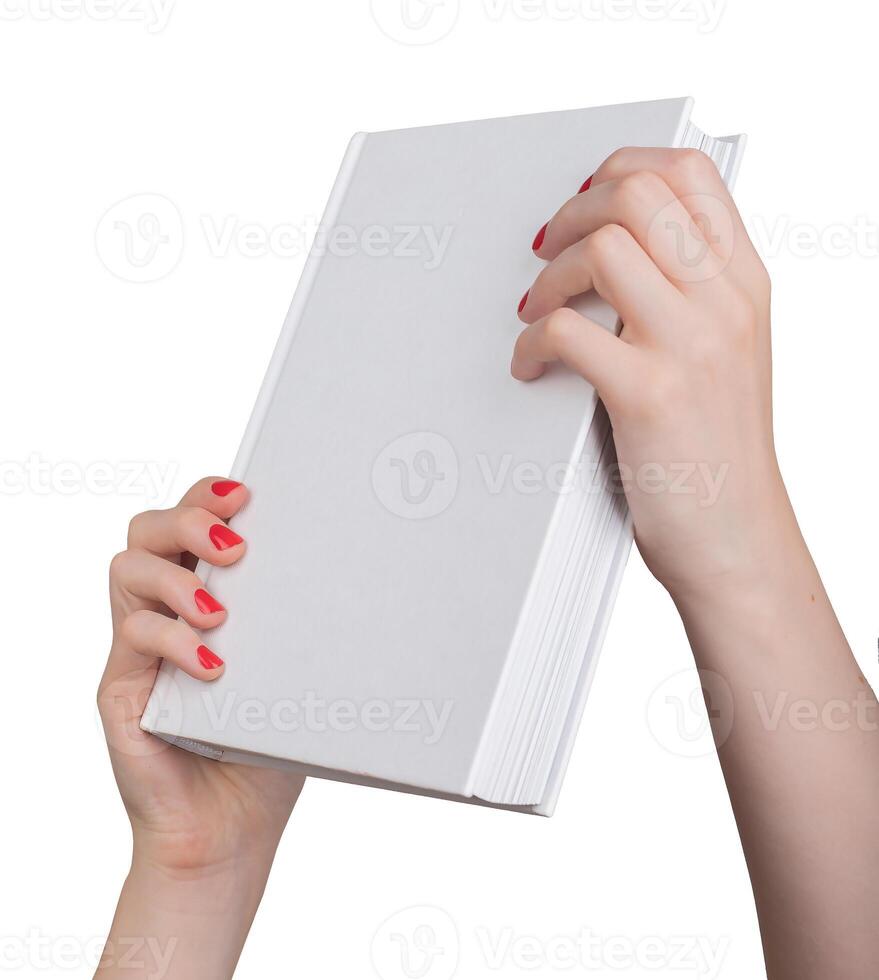 Book cover mockup. Hand holding hard cover with blank white template. Woman with red manicure, photo
