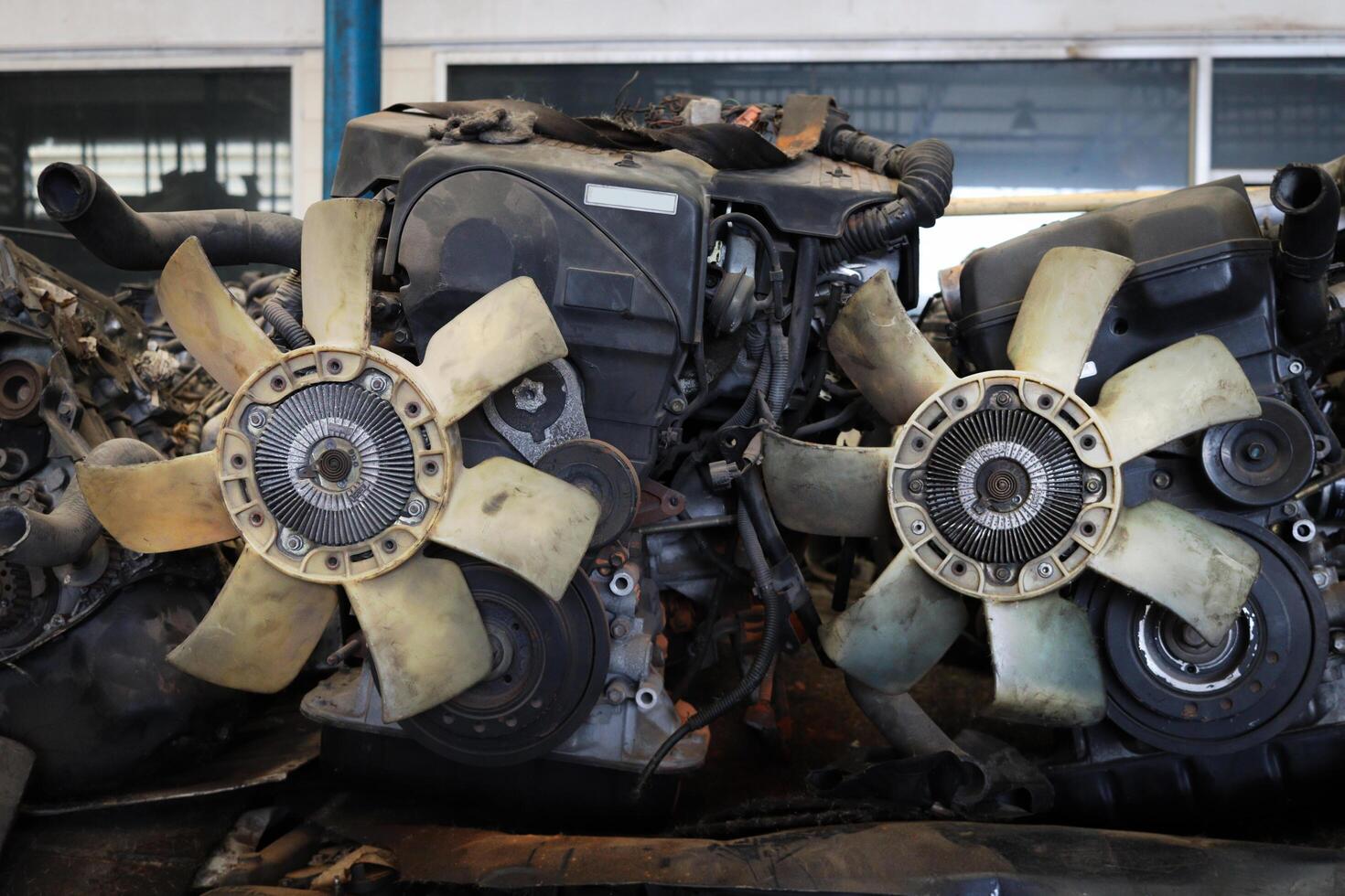 Auto parts and secondhand engine components in auto spare parts store. Spare parts of vehicle in warehouse. photo