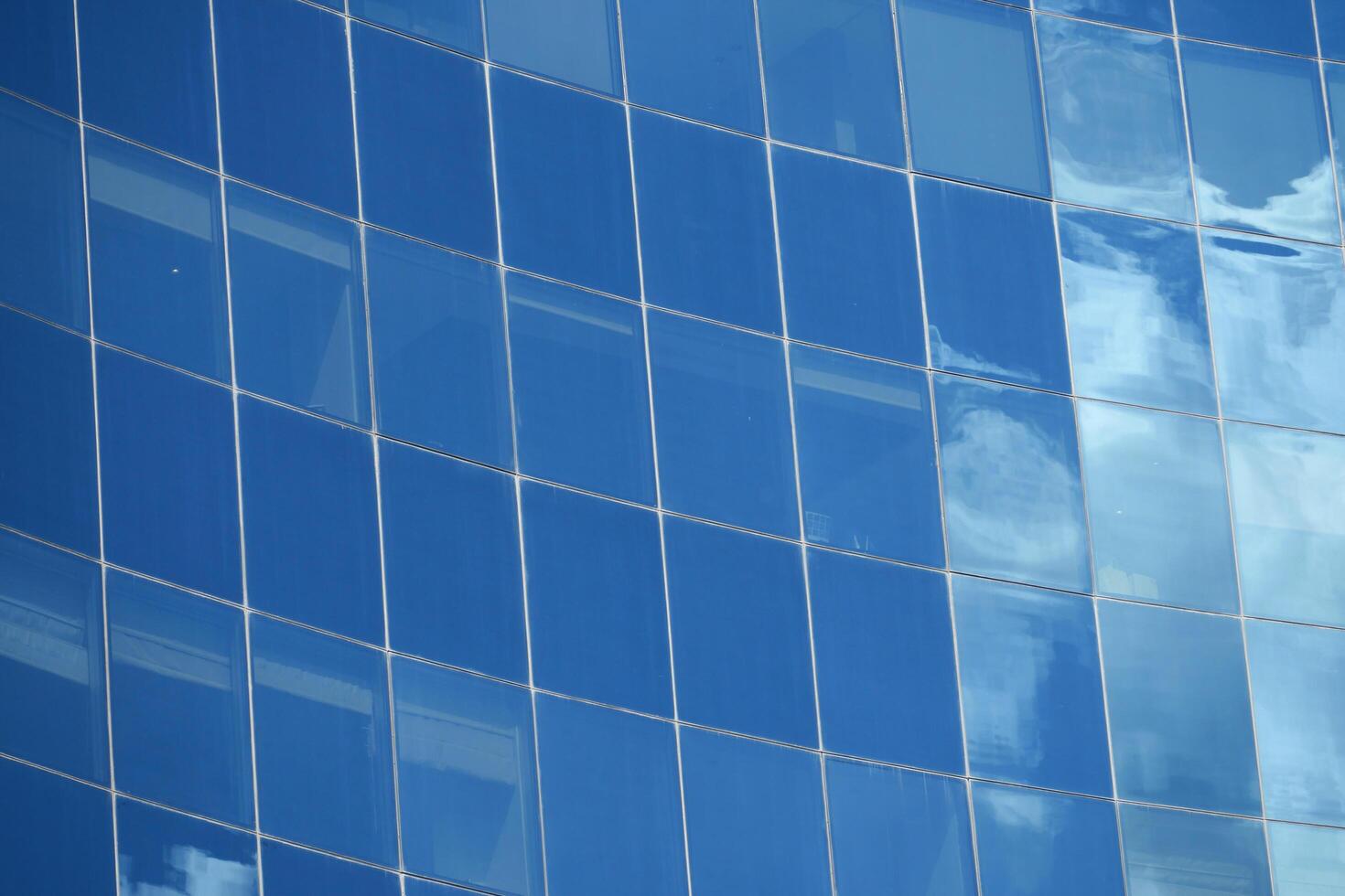 This is an abstract reflection created on a blue tiled surface that brings serenity and elegance photo