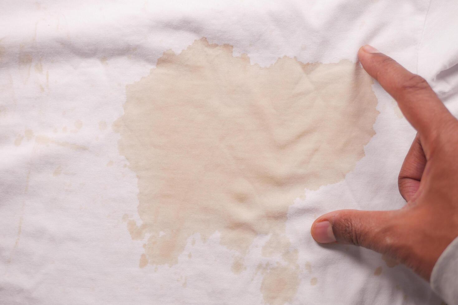spilled coffee on a white shirt photo