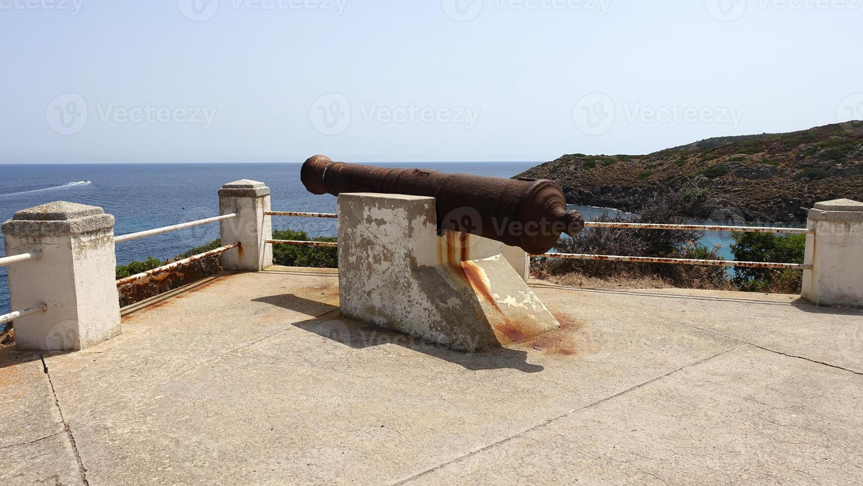 Ancient cannon on one of the Asinara sea viewpoints in Sardinia, Italy. photo