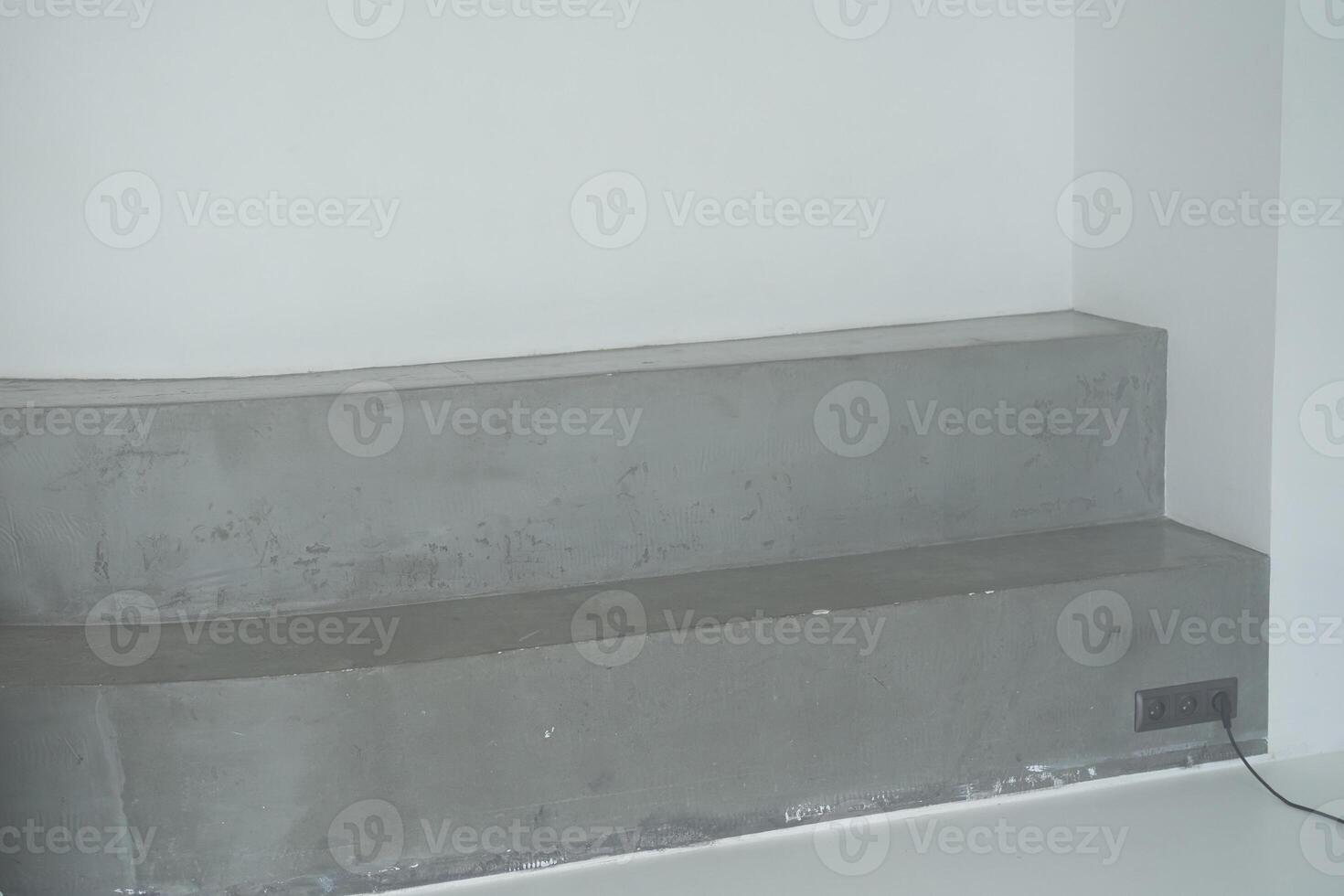 A stone podium in the form of a staircase for displaying goods or cosmetics. Eco-trends. With space to copy photo