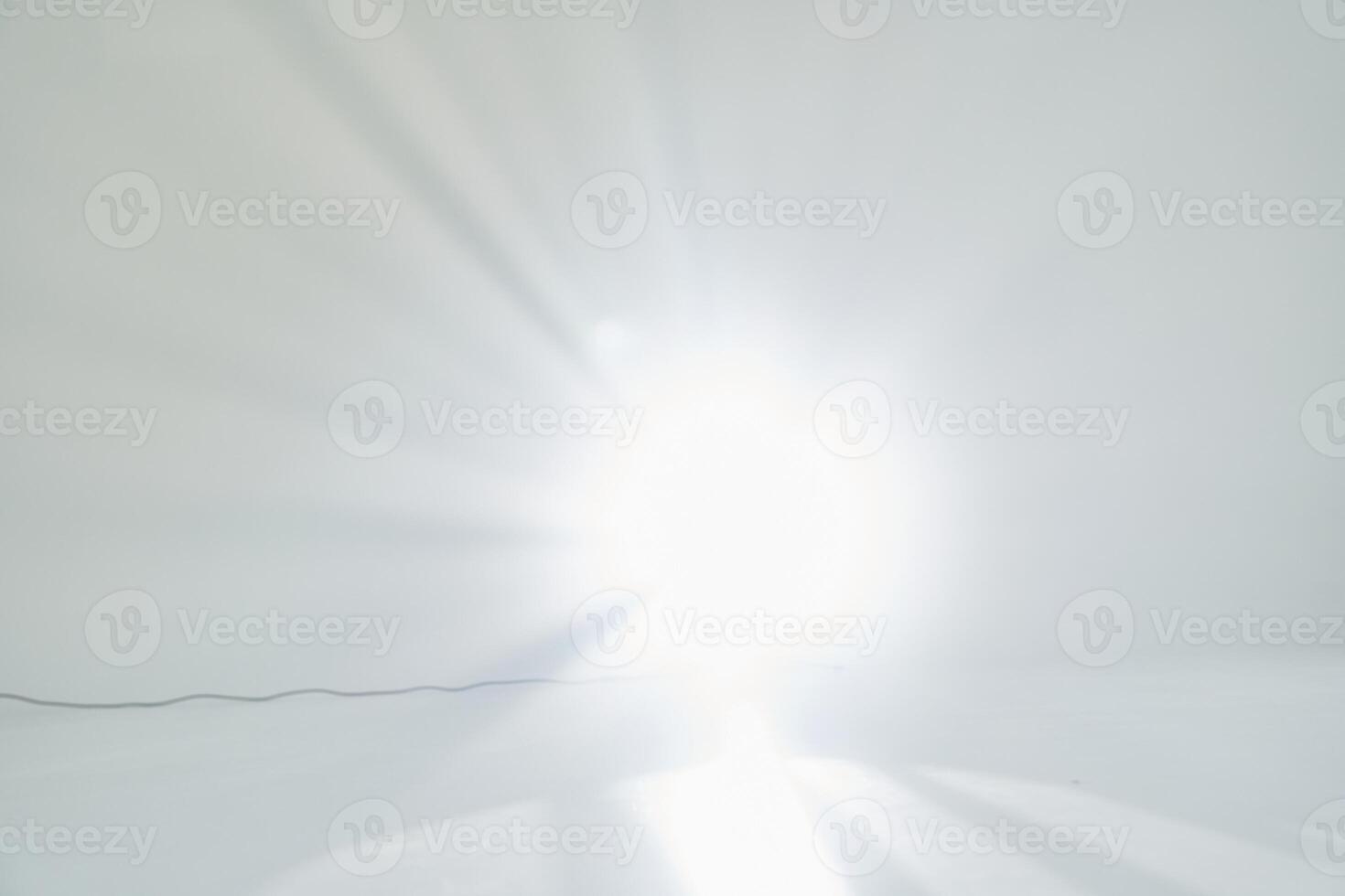 The light effect is a flash. A light beam in the room, a bright flash. With space to copy, overlay for your design photo