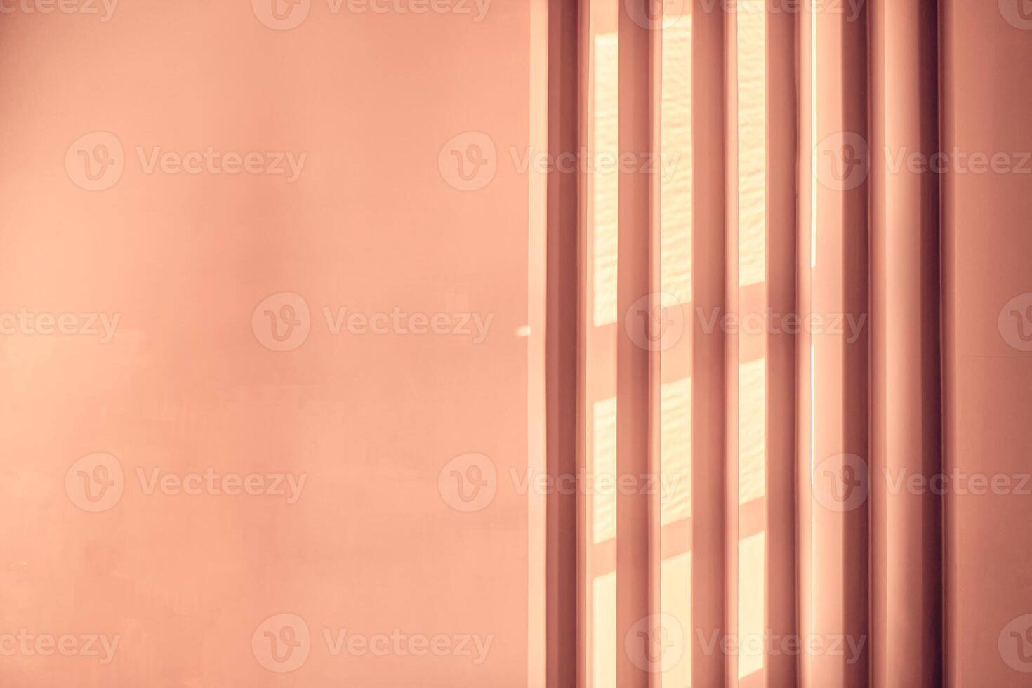 Abstract peach fuzz background with geometric vertical slats, backdrop with copy space, light and shadow pattern. Stylish template, mock up for your design, art, poster, presentation photo