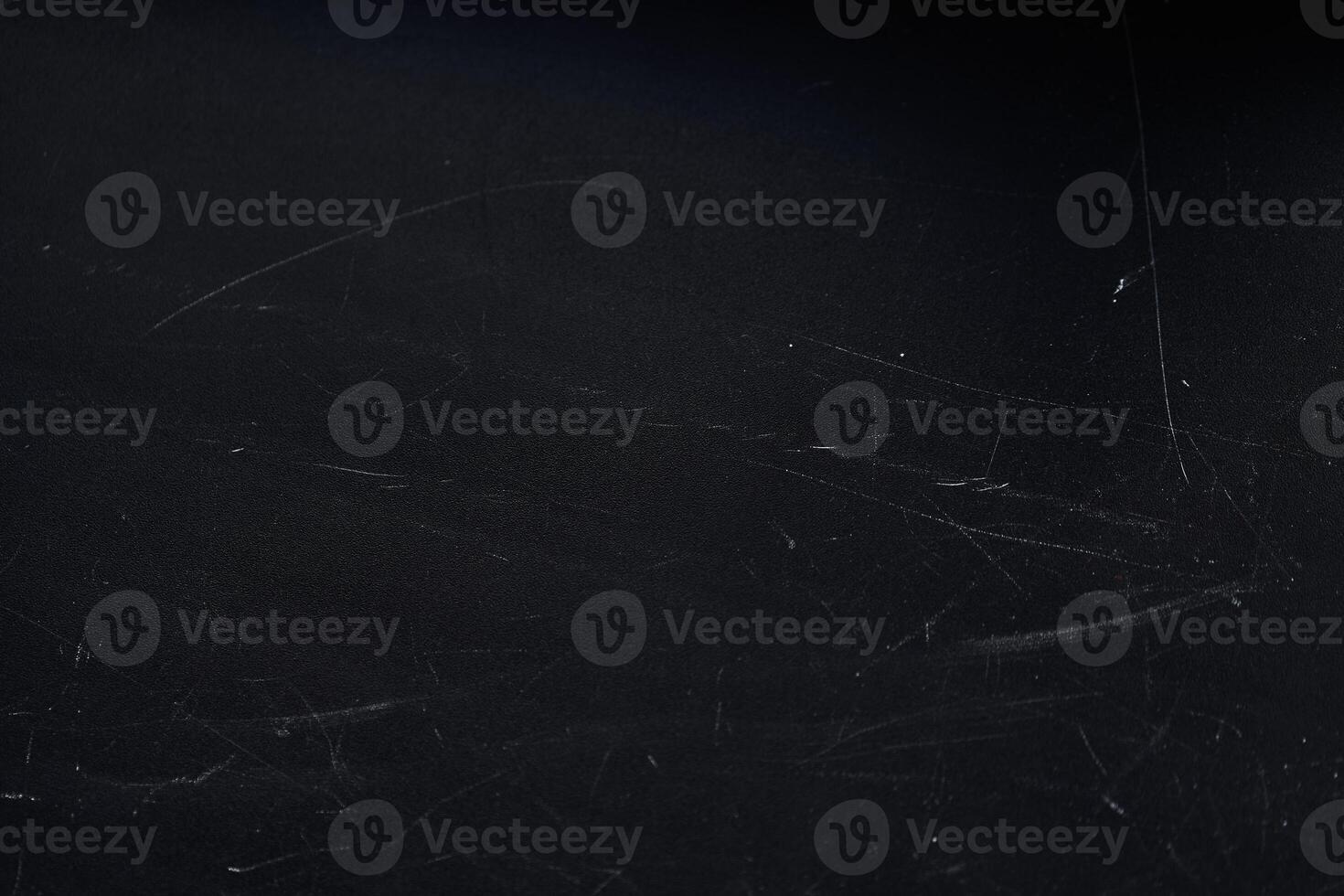 Close up view of an abstract background with white scratches isolated on black background with empty, copy space. Template, mock up, overlay for your design, art photo