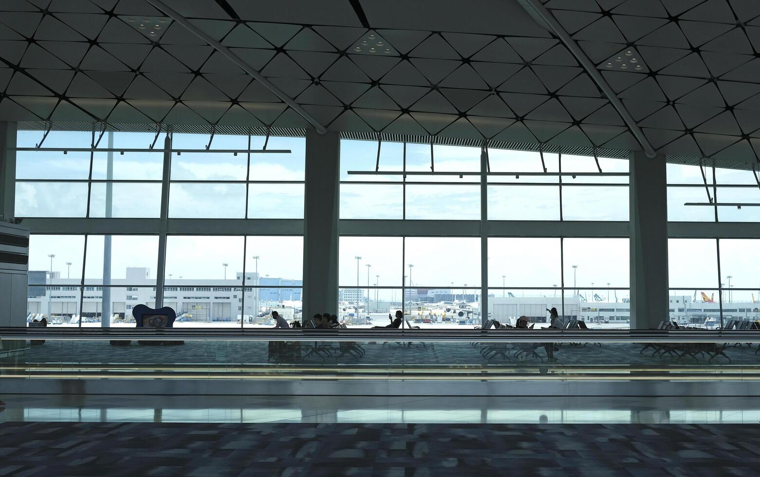 Airport terminal huge glass window with view of airplanes, the gate of departure hall for travelling photo