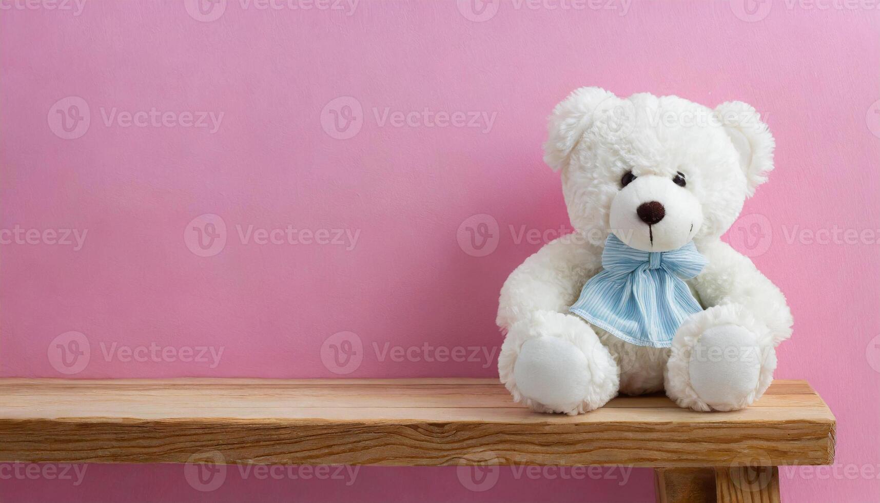 Close-up of beautiful teddy bear sitting on wooden bench, children's plush toy. Pink background. photo