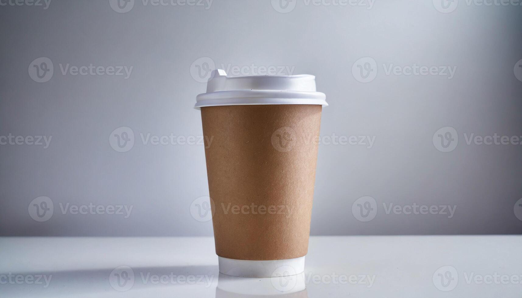Disposable paper coffee cup with lid. Empty polystyrene drinking mug mock-up. photo