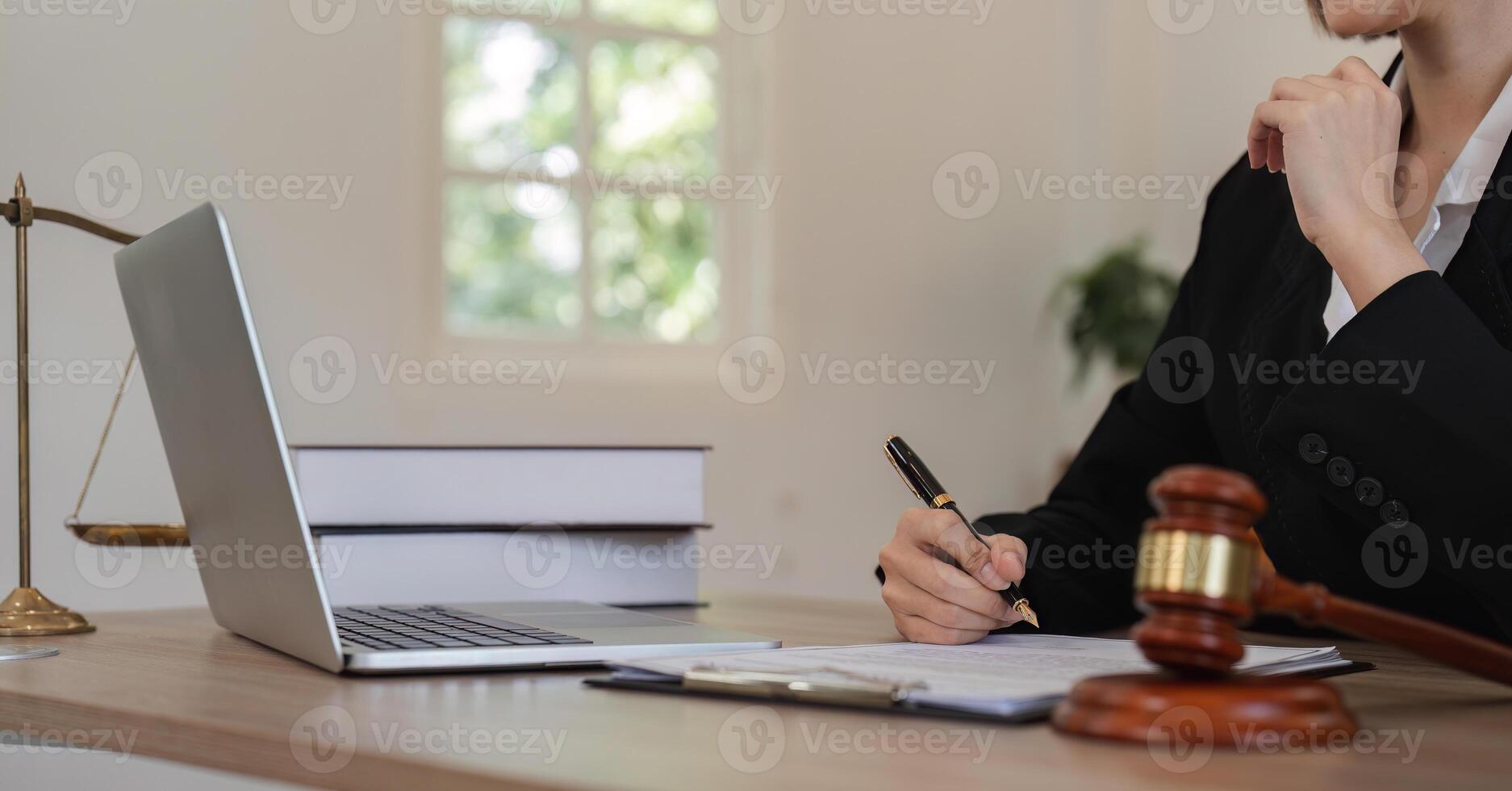 Young Lawyer Introducing and Signing Contract Documents with Clients in a Modern Office Setting photo