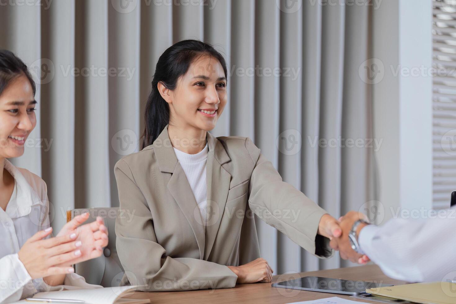 Business Professionals Engaging in Discussion and Idea Exchange in a Modern Office Setting photo