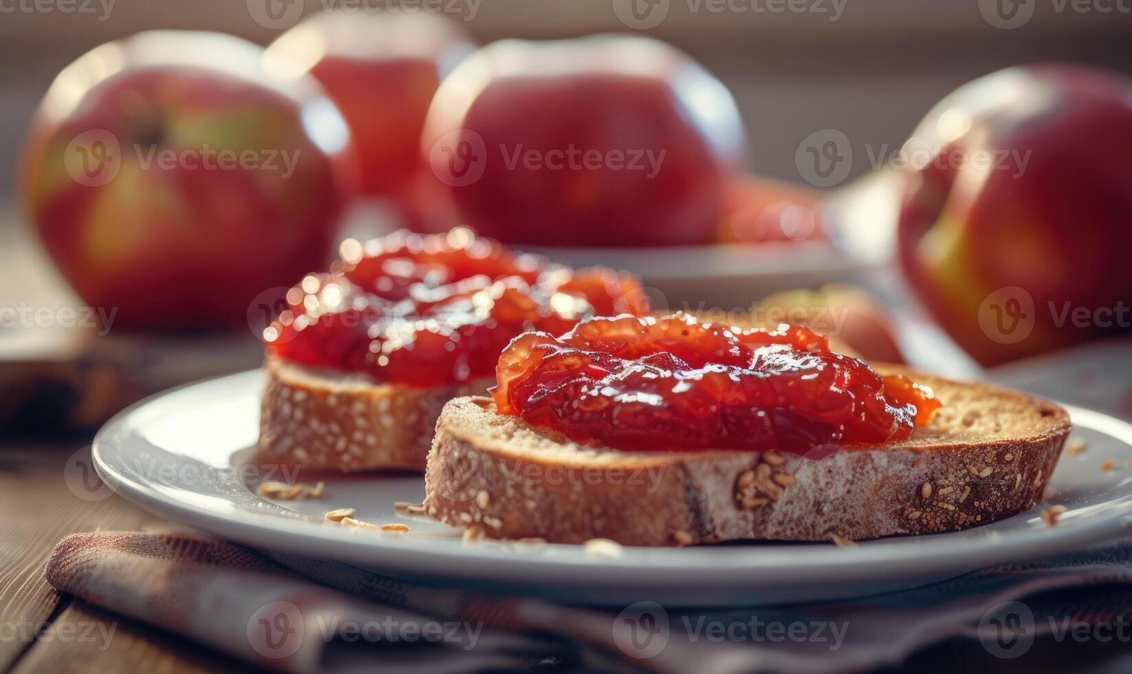 Apple jam spread on toast with fresh apples in the background photo