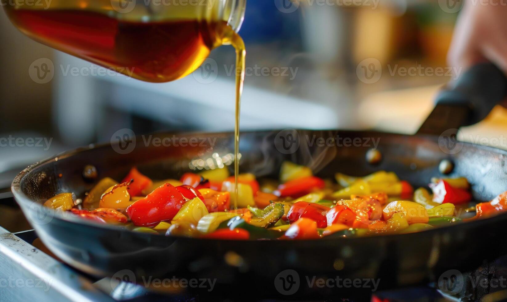 Apple syrup being used as a glaze for roasted vegetables photo