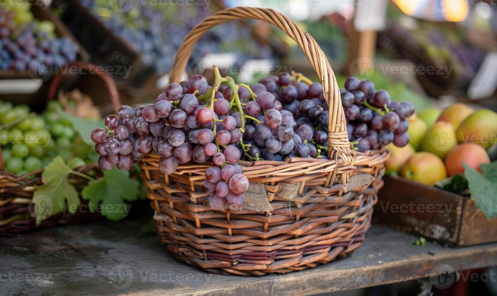 Grapes in a wicker basket on a farm market table photo