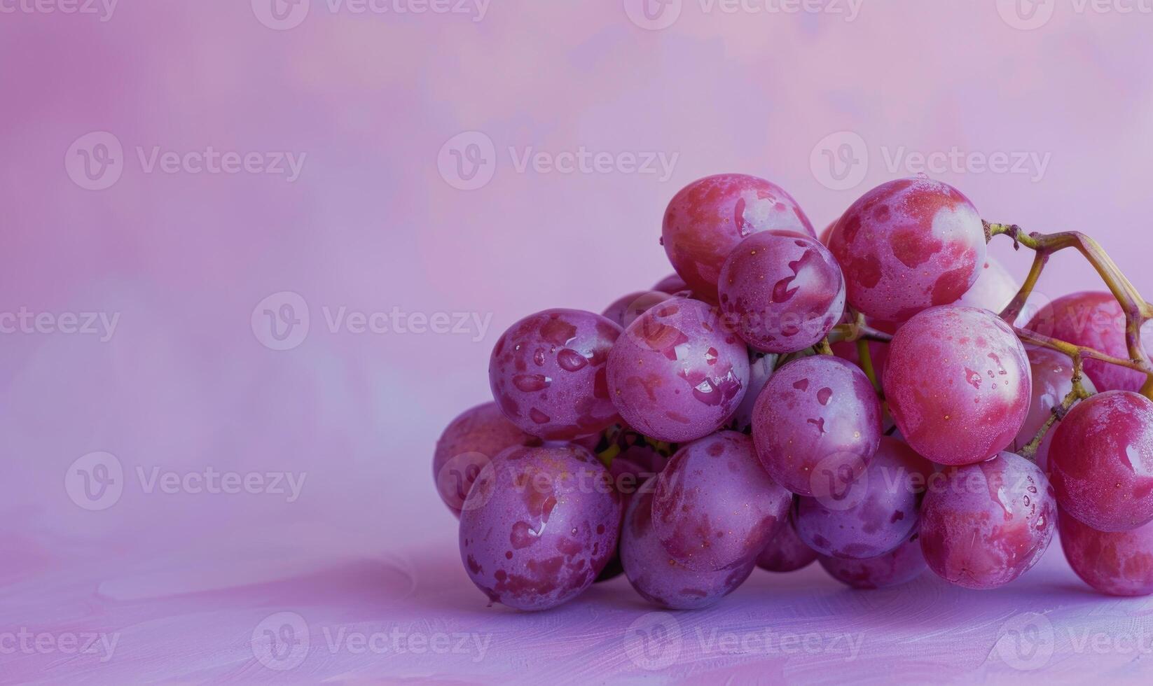Grapes on a light pastel lavender background photo