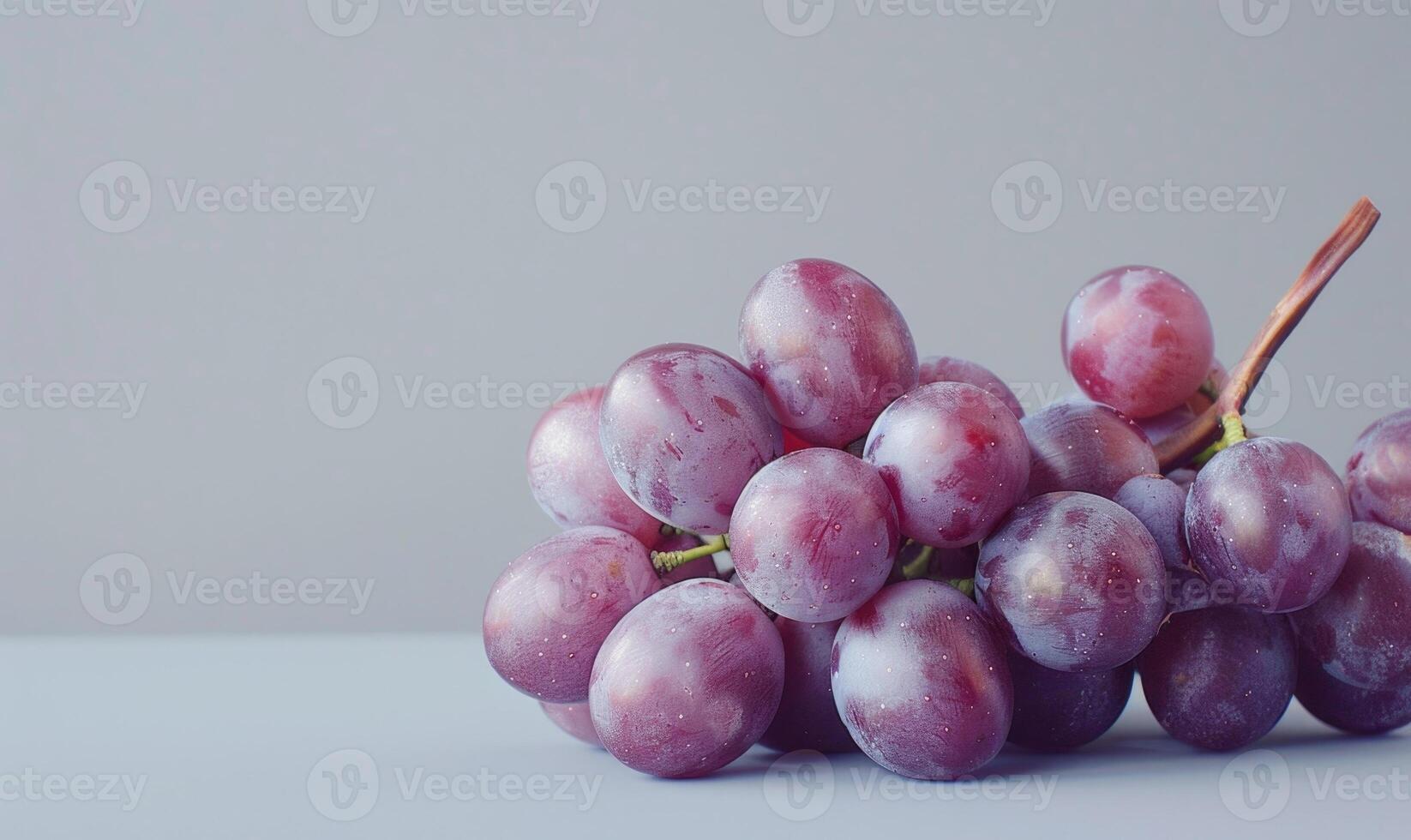 Grapes on a pastel gray background photo
