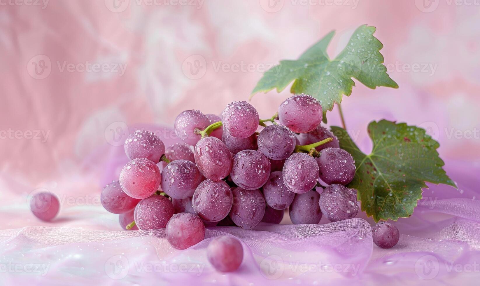 Grapes on a pastel rose background photo
