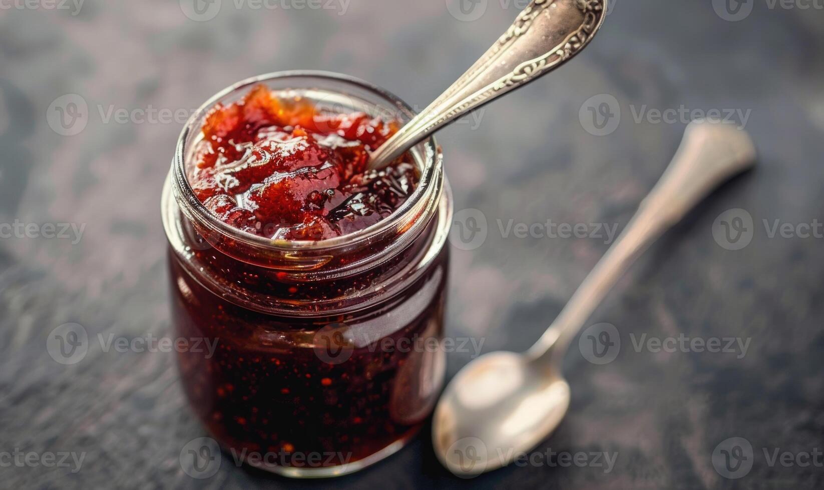 Homemade apple jam in a mason jar photo