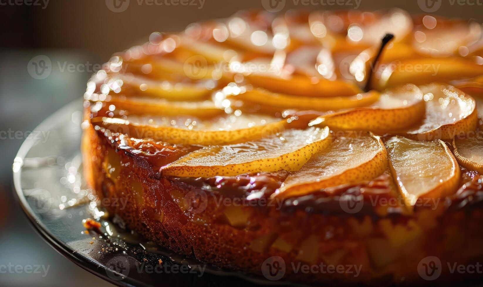 Pear upside-down cake, golden and caramelized photo