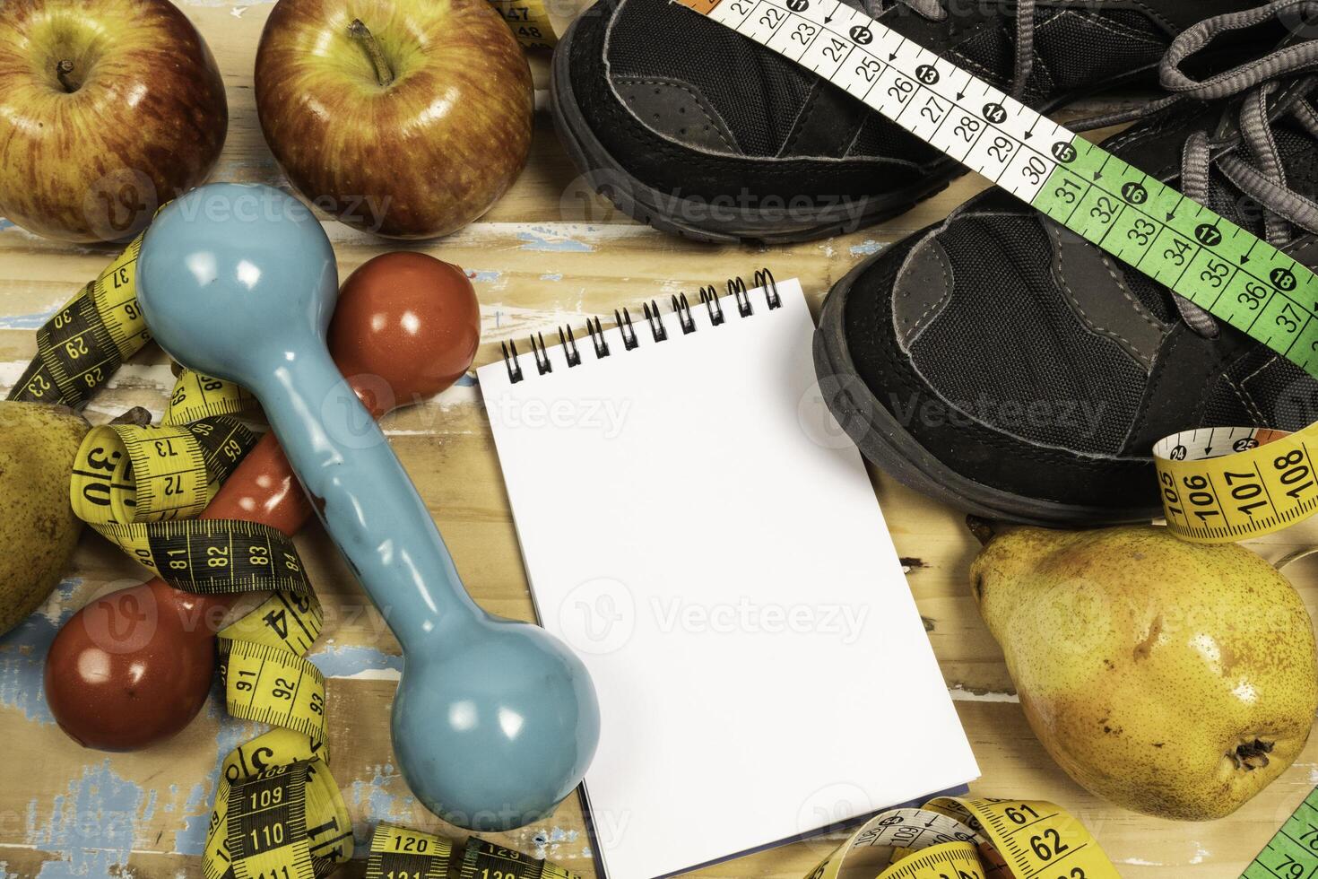 fruit for weight loss with measuring tape and equipment for exercise and diet, weight loss photo