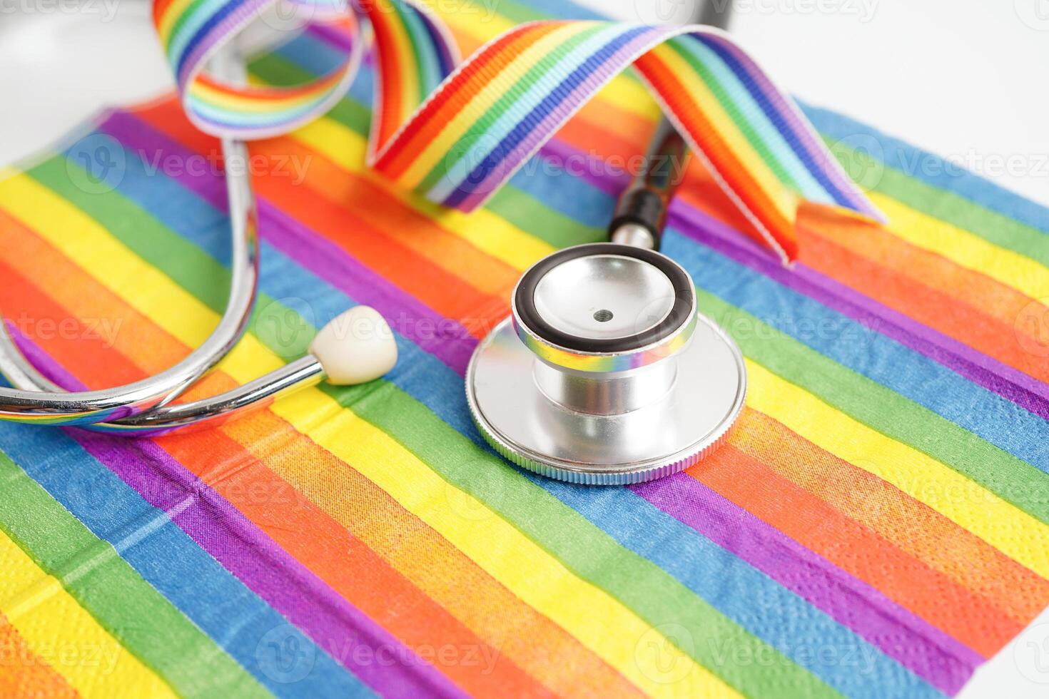 LGBT symbol, Stethoscope on rainbow flag, rights and gender equality, LGBT Pride Month in June. photo