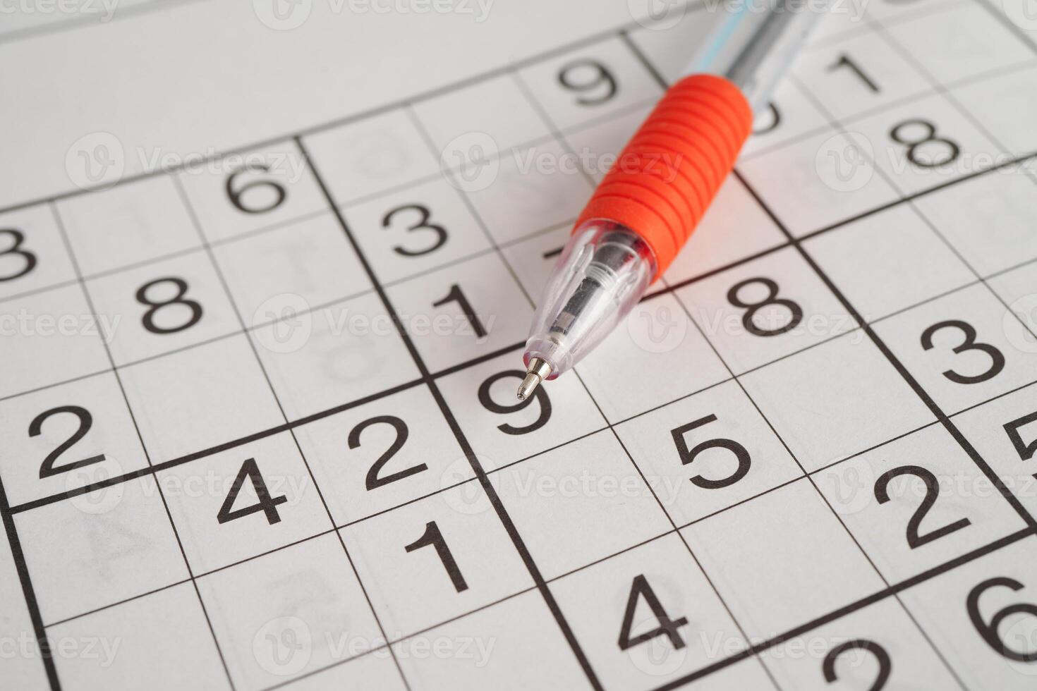 Sudoku puzzle, game to play for keep you brain younger for developing Alzheimer disease in senior patient. photo