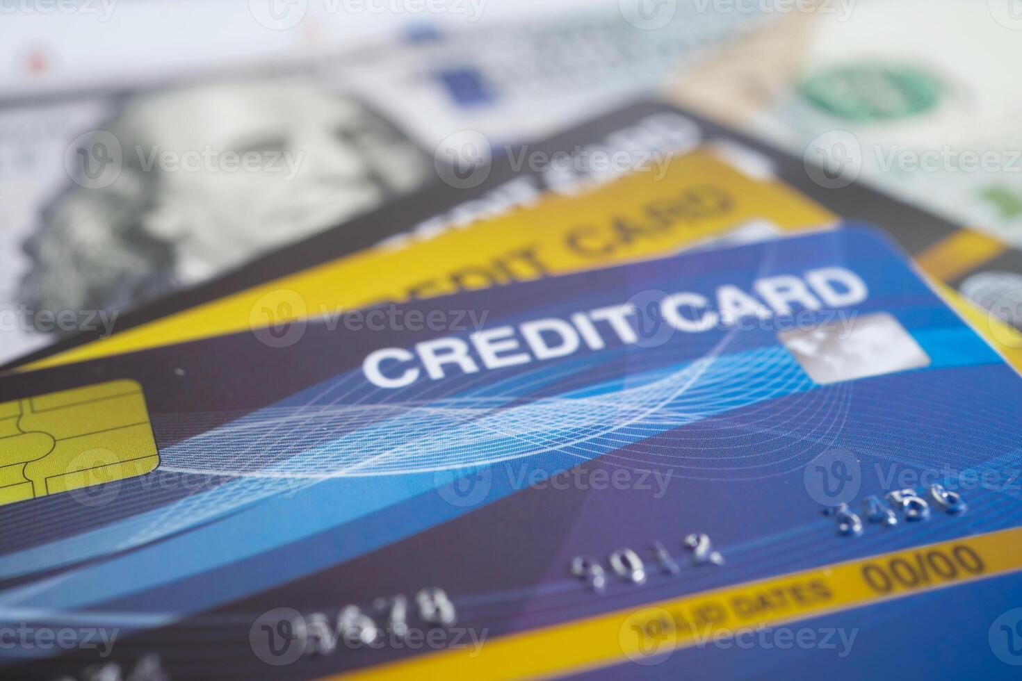 Credit card with password key lock and US dollar banknote money, security finance business concept. photo