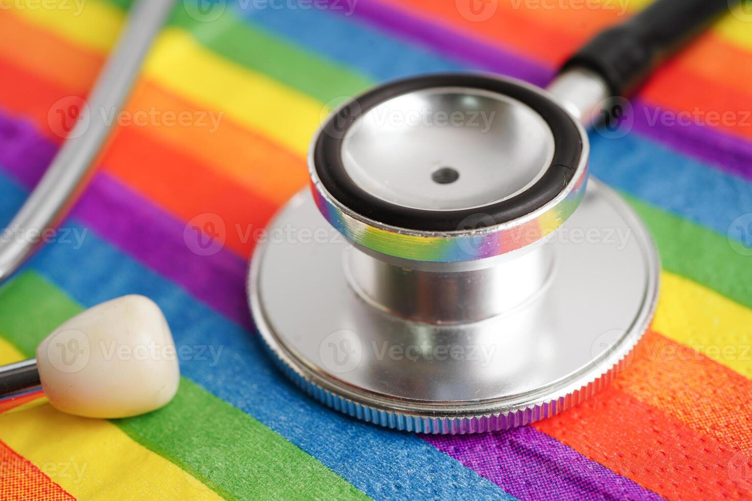 LGBT symbol, Stethoscope on rainbow flag, rights and gender equality, LGBT Pride Month in June. photo