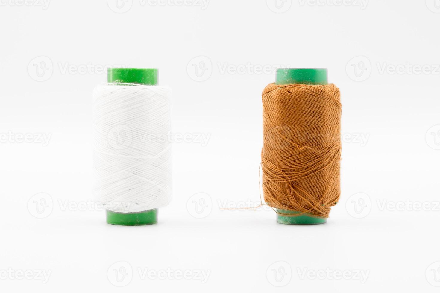 Colorful Spool of sewing thread, spool of industrial threads, Colored spools of thread on a white background. photo