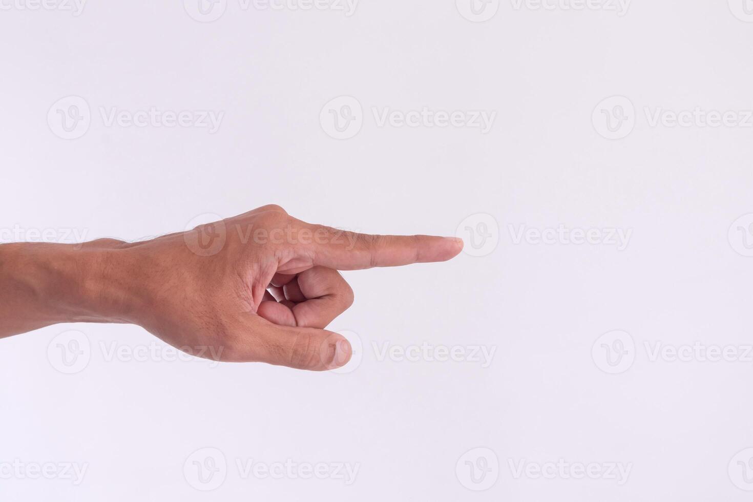 A man's hand with a pose or gesture pointing at something on a white background photo