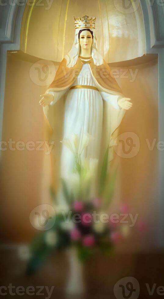 Mother Mary sacred peaceful prayer place, blessed Virgin Mary statue, praying Virgin Mary statue. Religious background on church interior background photo