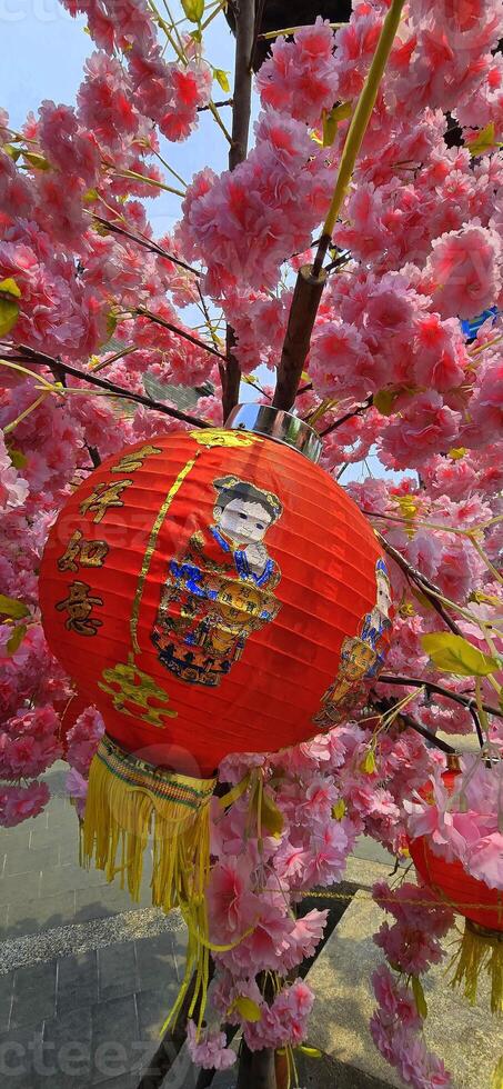 Chinese red lanterns during chinese new year festival, Chinese new year, new year celebration concept and happy new year Chinese, representing prosperity and happiness photo