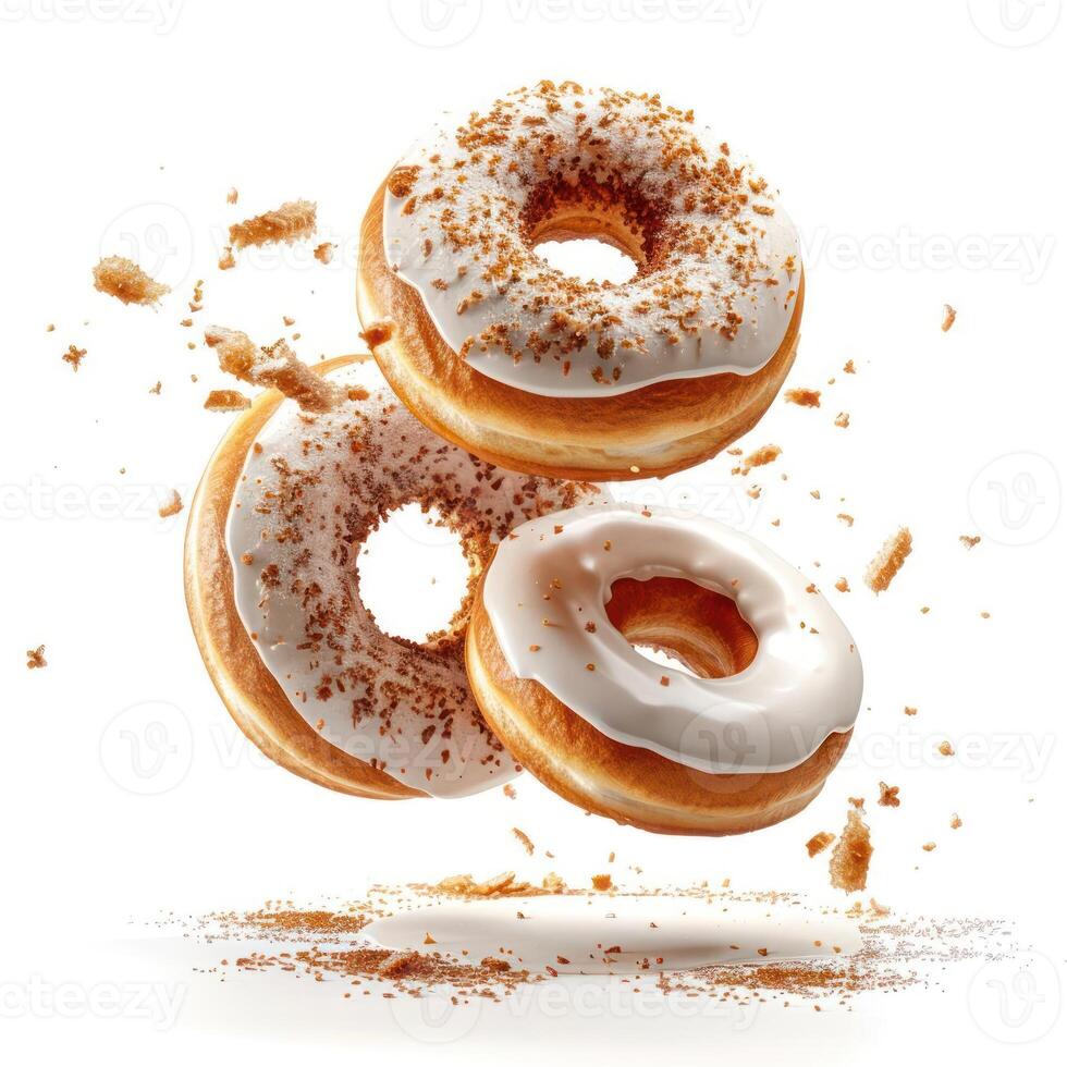 three donuts with icing and sprinkles on them photo