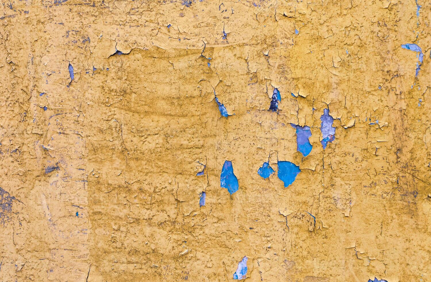 Old plaster on the facade of a building. photo
