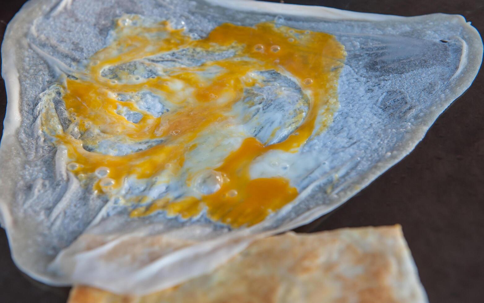 Breakfast roti eaten with drinks photo