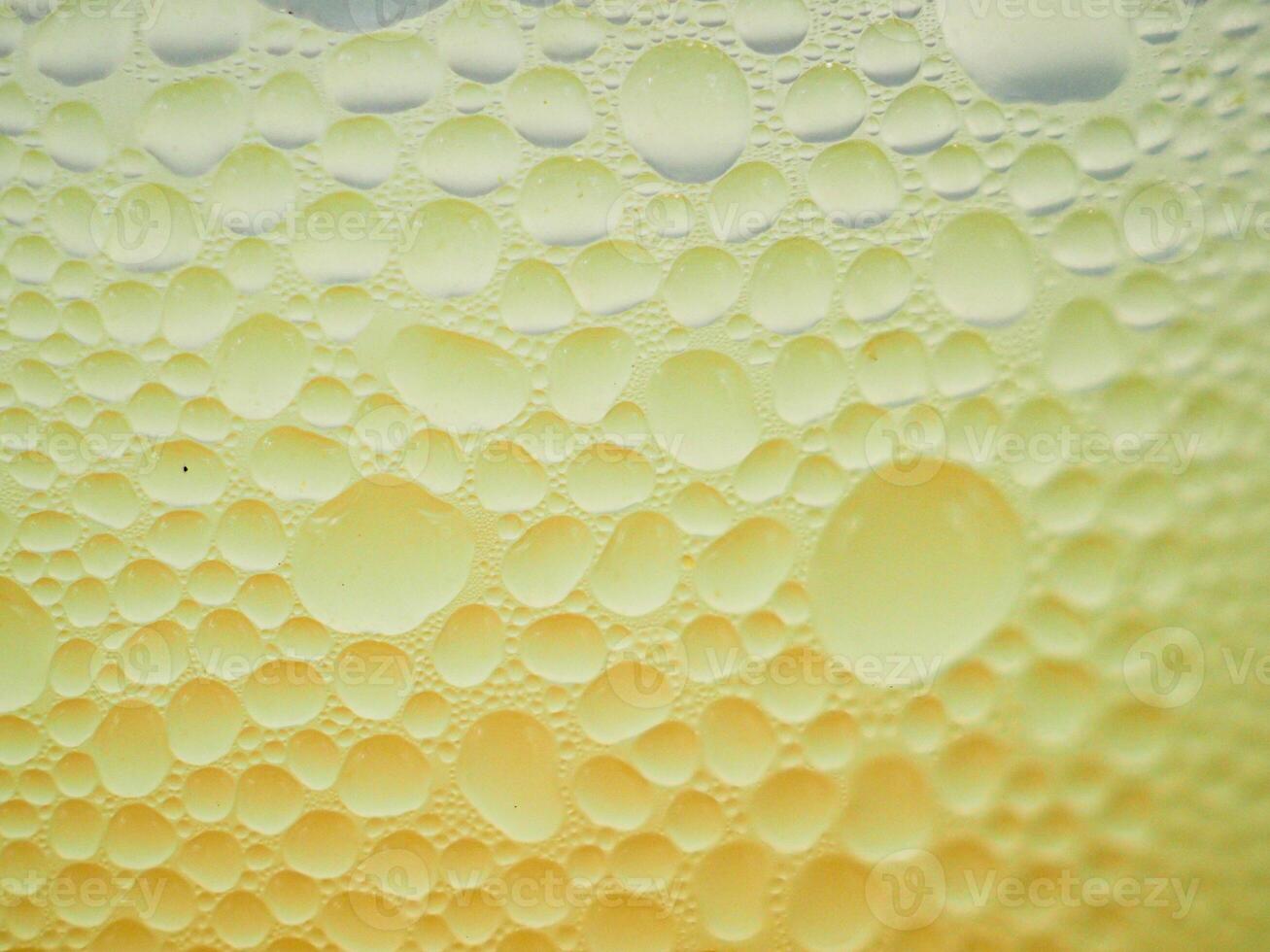 Drops of ice on an iced coffee glass photo
