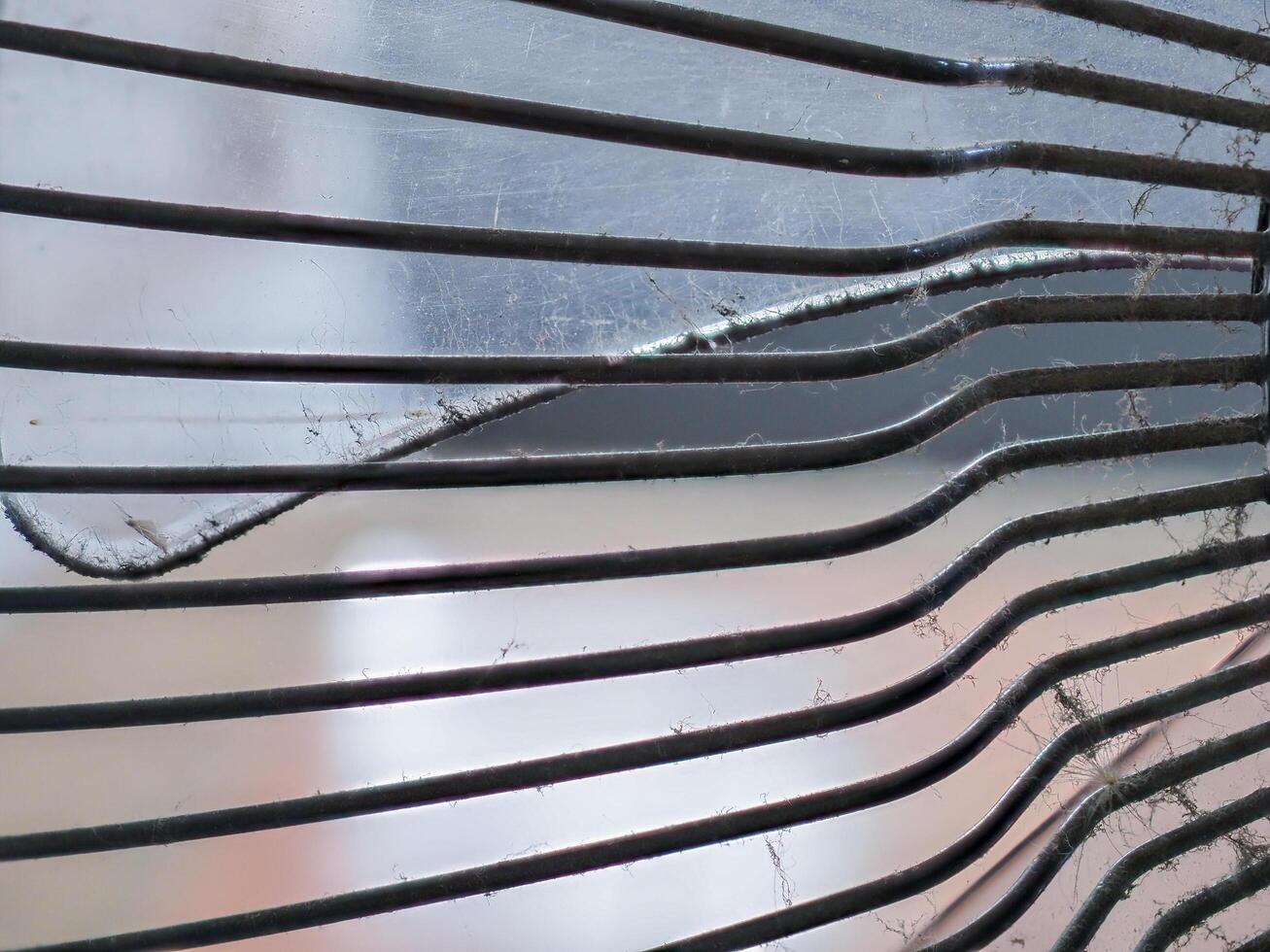 Dust and rust on fan blades and grilles photo