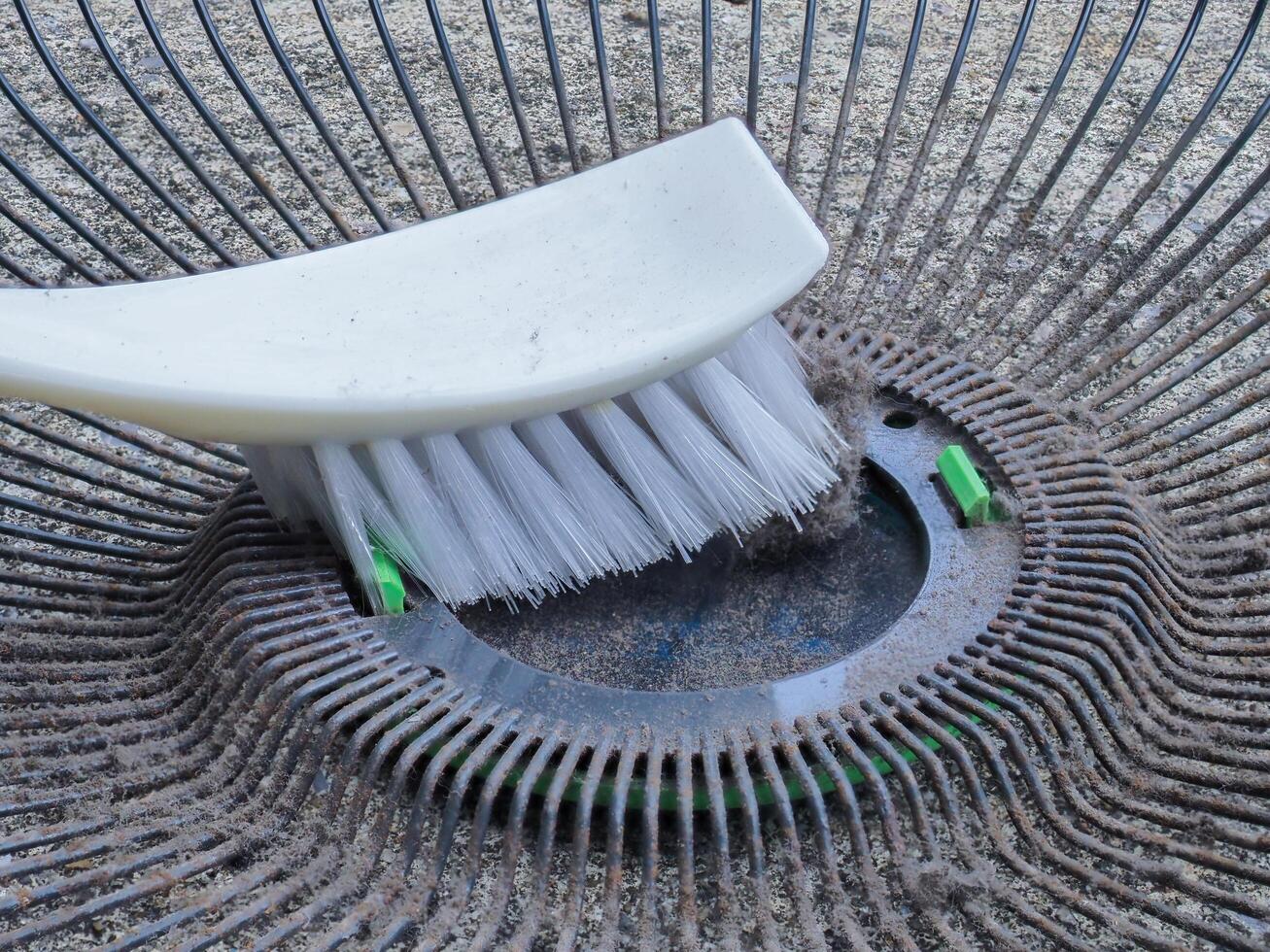 Dust and rust on fan blades and grilles photo