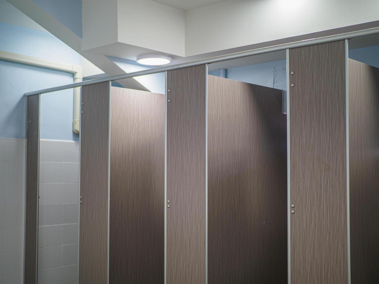 Toilet in the men's bathroom photo
